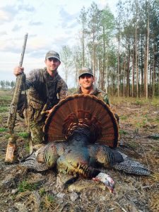 Trey and Cody Harrell with a gobbler in Spring 2015 